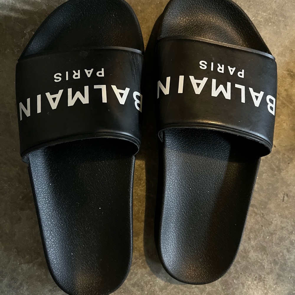 Balmain black slides.